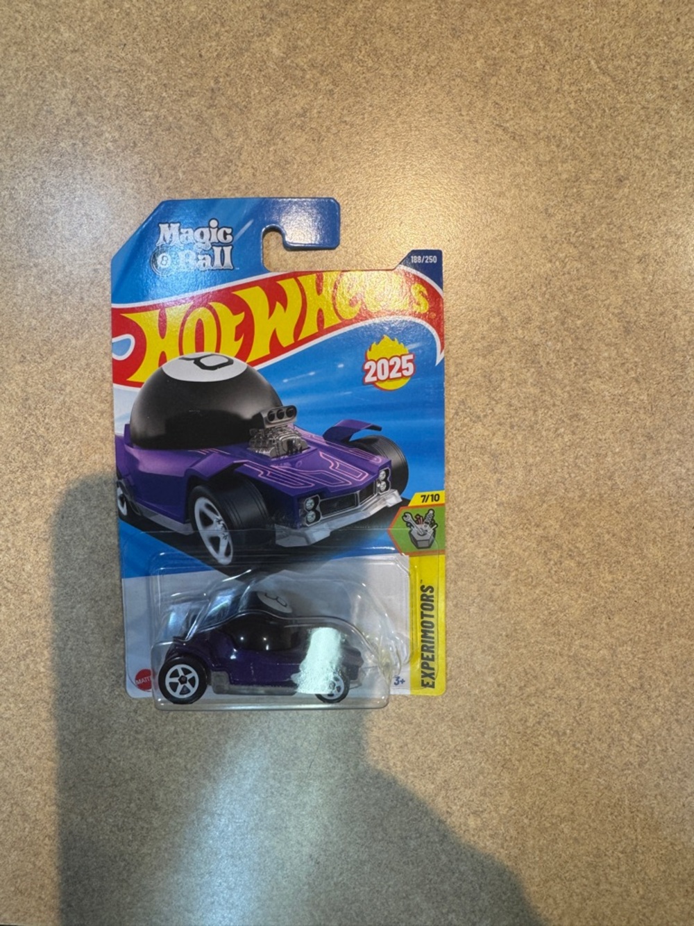 Both Die-cast toy car titled 'Decidedly Go Magic 8 Ball' by Hot Wheels